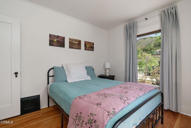 422 Foothill Dr, Fillmore, CA 93015 - bedroom with crown molding and wood finished floors