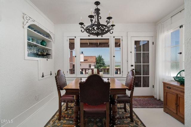 422 Foothill Dr, Fillmore, CA 93015 - dining area featuring a chandelier, crown molding, and french doors