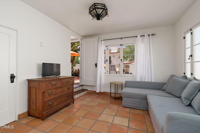 422 Foothill Dr, Fillmore, CA 93015 - living room with plenty of natural light, baseboards, and light tile patterned flooring