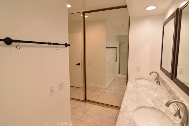 5369 Algarrobo Unit 1G, Laguna Woods, CA 92637 - bathroom with double vanity, tile patterned floors, and recessed lighting