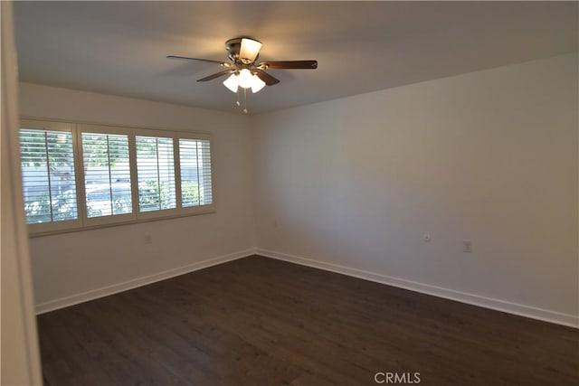 5369 Algarrobo Unit 1G, Laguna Woods, CA 92637 - spare room with dark wood-type flooring and a ceiling fan