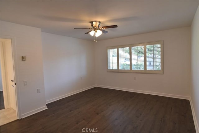 5369 Algarrobo Unit 1G, Laguna Woods, CA 92637 - empty room with a ceiling fan and dark wood-type flooring