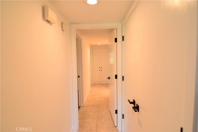 5369 Algarrobo Unit 1G, Laguna Woods, CA 92637 - hallway featuring light tile patterned flooring and baseboards