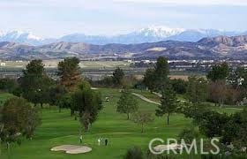 5369 Algarrobo Unit 1G, Laguna Woods, CA 92637 - surrounding community featuring a mountain view, a yard, and view of golf course
