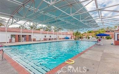 5369 Algarrobo Unit 1G, Laguna Woods, CA 92637 - indoor pool with a patio area