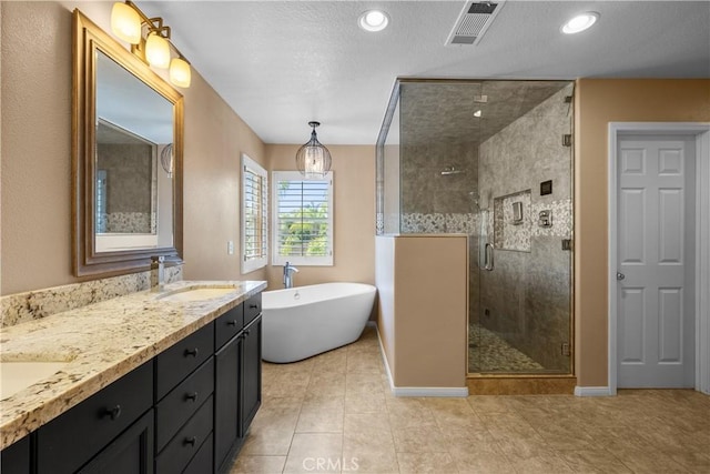 29012 Madrid Pl, Castaic, CA 91384 - full bath with a stall shower, a soaking tub, double vanity, tile patterned flooring, and baseboards