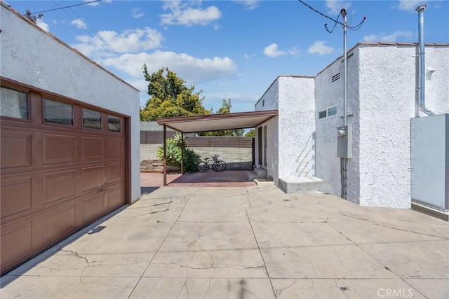 7037 Cimarron St, Los Angeles, CA 90047 - garage featuring a carport