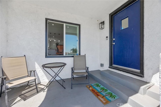 7037 Cimarron St, Los Angeles, CA 90047 - view of exterior entry with stucco siding