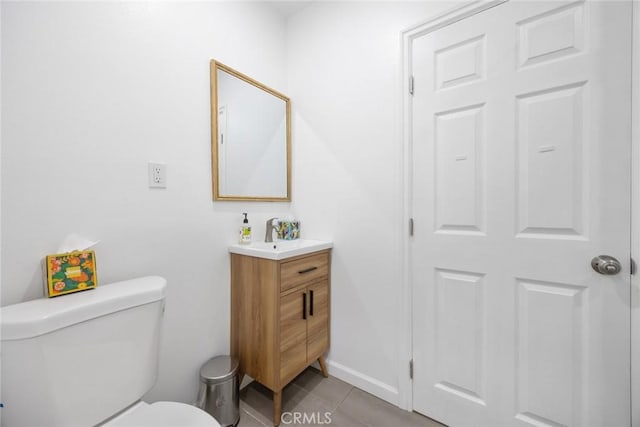7037 Cimarron St, Los Angeles, CA 90047 - bathroom with vanity and tile patterned flooring