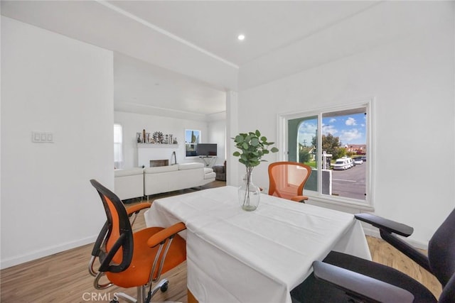 7037 Cimarron St, Los Angeles, CA 90047 - dining area featuring wood finished floors and recessed lighting