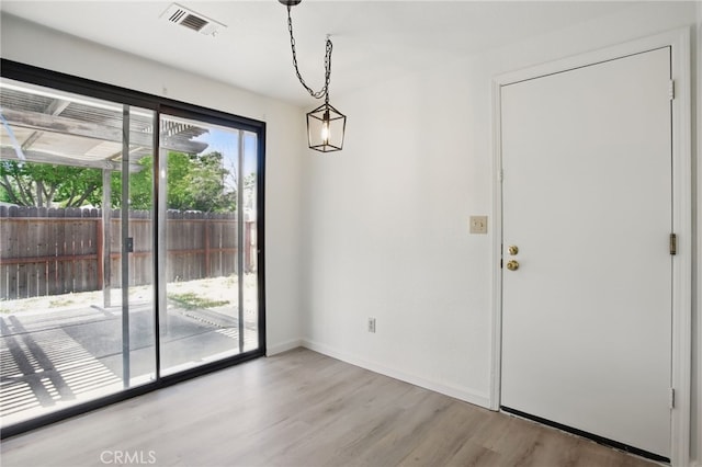 7000 Verdure Way, Elk Grove, CA 95758 - unfurnished dining area featuring wood finished floors and baseboards