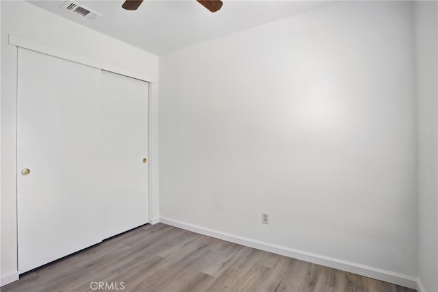 7000 Verdure Way, Elk Grove, CA 95758 - unfurnished bedroom featuring light wood-style floors, a closet, baseboards, and a ceiling fan