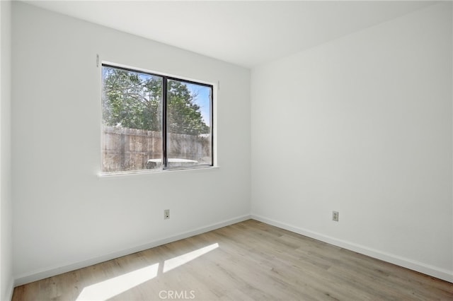 7000 Verdure Way, Elk Grove, CA 95758 - spare room with light wood-style floors and baseboards