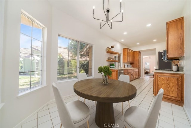 27331 Prominence Rd, Menifee, CA 92586 - dining area featuring a chandelier, light tile patterned floors, recessed lighting, and baseboards