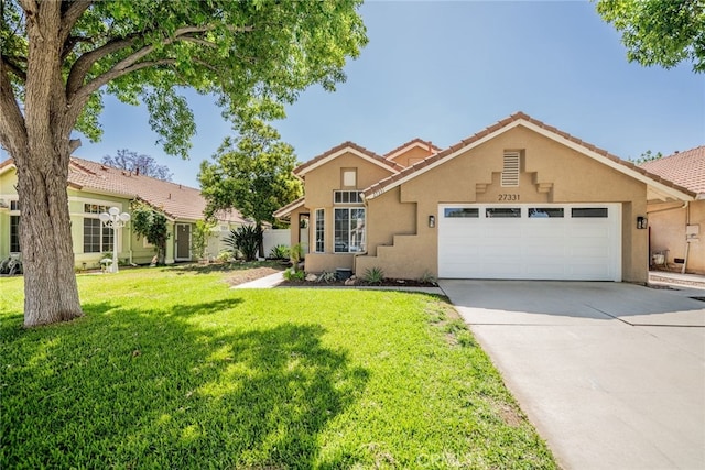 27331 Prominence Rd, Menifee, CA 92586 - view of front facade featuring stucco siding, an attached garage, a front yard, concrete driveway, and a tiled roof