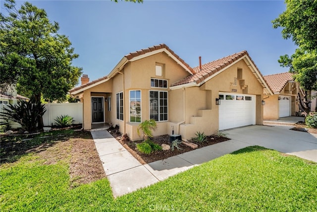 27331 Prominence Rd, Menifee, CA 92586 - view of front facade featuring concrete driveway, stucco siding, an attached garage, and a tiled roof