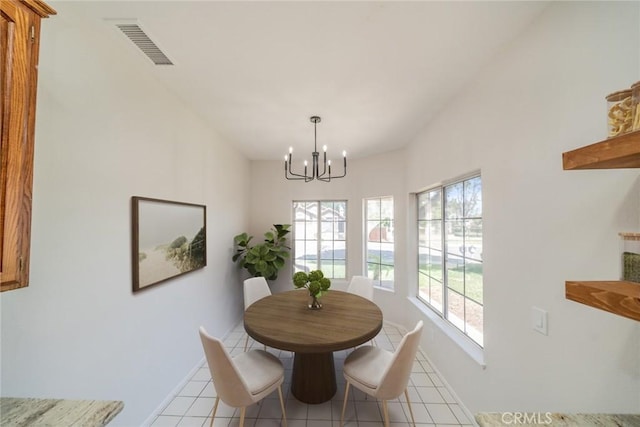 27331 Prominence Rd, Menifee, CA 92586 - dining space featuring a chandelier, baseboards, and light tile patterned flooring