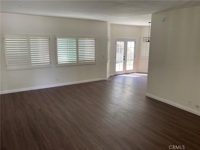 28769 Magnolia Way, Saugus, CA 91390 - empty room with dark wood-style floors, french doors, and baseboards
