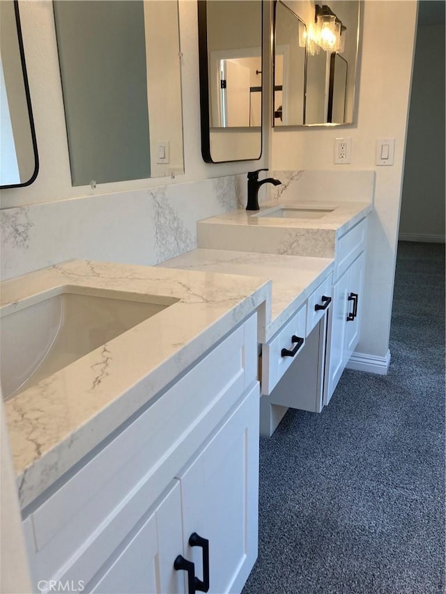 28769 Magnolia Way, Saugus, CA 91390 - bathroom with double vanity and baseboards