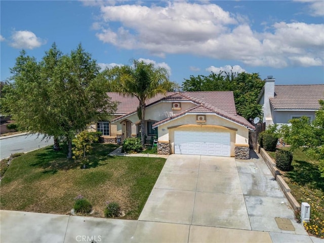 889 Sycamore Ct, Banning, CA 92220 - mediterranean / spanish home featuring a tiled roof, stucco siding, stone siding, and a front yard