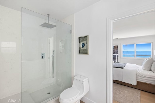 326 Boca Del Canon, San Clemente, CA 92672 - bathroom with ensuite bathroom, a walk in shower, toilet, baseboards, and wood finished floors