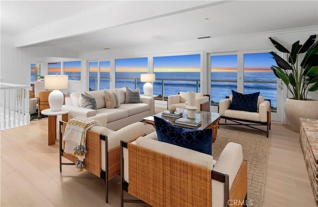 326 Boca Del Canon, San Clemente, CA 92672 - living room featuring light wood-type flooring, a water view, and crown molding