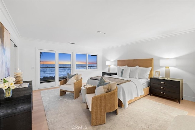 326 Boca Del Canon, San Clemente, CA 92672 - bedroom with crown molding, light wood-style floors, and a water view