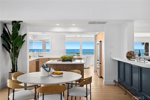 326 Boca Del Canon, San Clemente, CA 92672 - dining room with light wood-type flooring, plenty of natural light, a water view, and recessed lighting