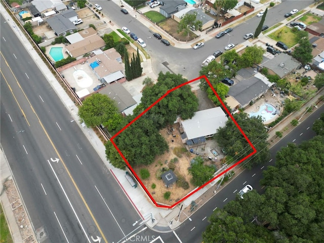 1104 W F St, Ontario, CA 91762 - aerial perspective of suburban area with property parcel outlined