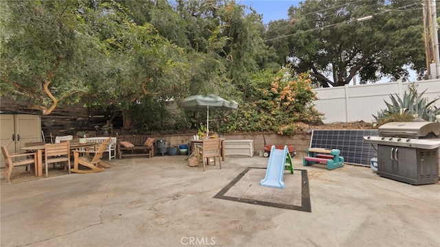 1104 W F St, Ontario, CA 91762 - view of patio / terrace with outdoor dining space and a grill