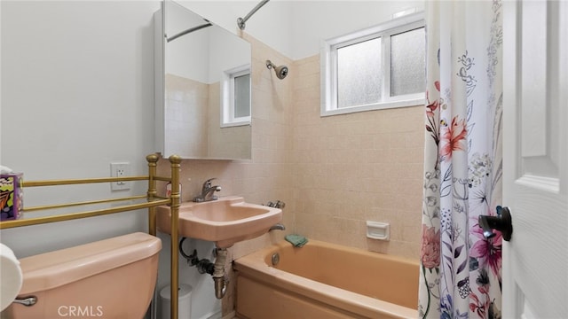 1104 W F St, Ontario, CA 91762 - bathroom featuring toilet, shower / bath combination with curtain, and plenty of natural light