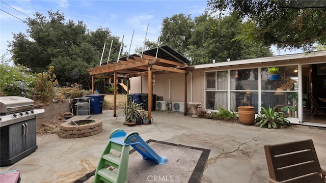1104 W F St, Ontario, CA 91762 - view of patio with a fire pit, area for grilling, and a pergola