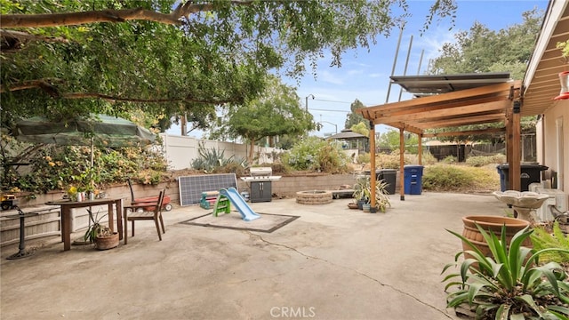 1104 W F St, Ontario, CA 91762 - fenced backyard with an outdoor fire pit and a patio area