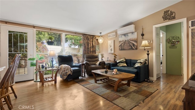 1104 W F St, Ontario, CA 91762 - living area with a wall mounted AC and wood finished floors