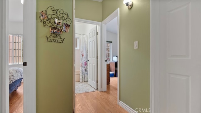1104 W F St, Ontario, CA 91762 - corridor featuring light wood-style floors and baseboards