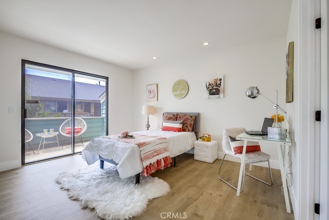 658 S Webster Ave Unit 4, Anaheim, CA 92804 - bedroom with access to outside, wood finished floors, recessed lighting, and baseboards