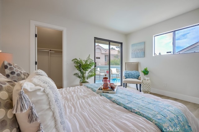 658 S Webster Ave Unit 4, Anaheim, CA 92804 - bedroom featuring access to outside, wood finished floors, baseboards, and a closet