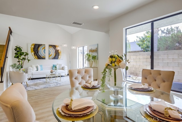 658 S Webster Ave Unit 4, Anaheim, CA 92804 - dining area with vaulted ceiling, wood finished floors, and recessed lighting