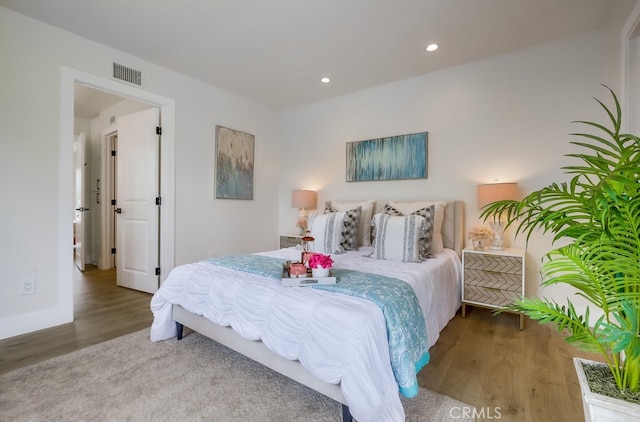 658 S Webster Ave Unit 4, Anaheim, CA 92804 - bedroom with wood finished floors, recessed lighting, and baseboards