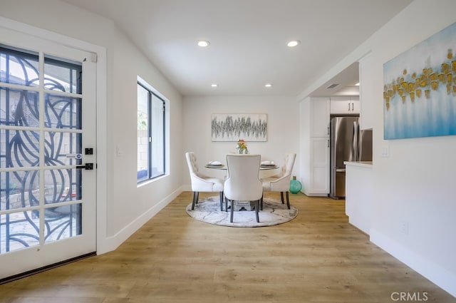 658 S Webster Ave Unit 4, Anaheim, CA 92804 - dining room featuring recessed lighting, light wood finished floors, and baseboards
