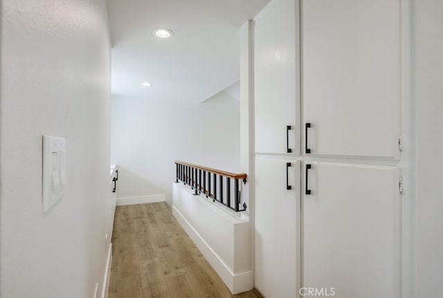658 S Webster Ave Unit 4, Anaheim, CA 92804 - hall with recessed lighting, light wood-type flooring, an upstairs landing, and baseboards