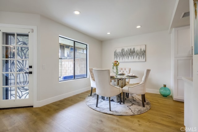 658 S Webster Ave Unit 4, Anaheim, CA 92804 - dining area with baseboards, light wood-style flooring, and recessed lighting