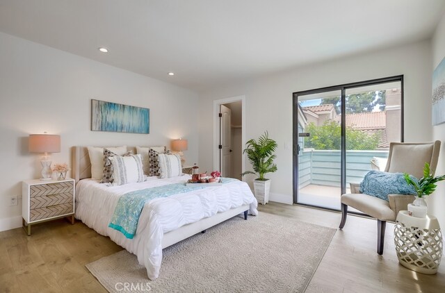658 S Webster Ave Unit 4, Anaheim, CA 92804 - bedroom with access to outside, light wood-style floors, recessed lighting, and baseboards