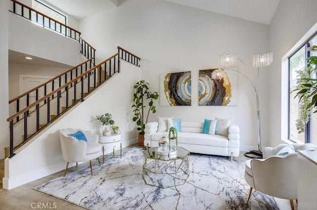 658 S Webster Ave Unit 4, Anaheim, CA 92804 - living area with a high ceiling, baseboards, stairway, wood finished floors, and recessed lighting