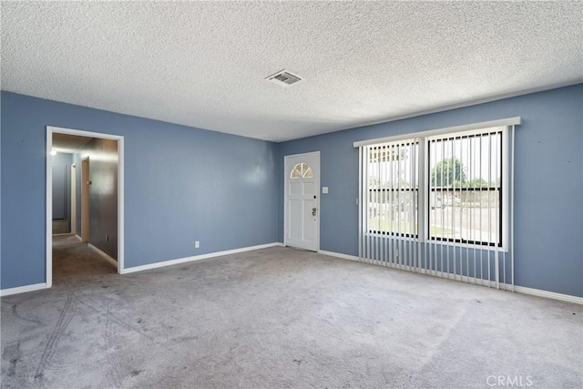 1254 Fieldgate Ave, Hacienda Heights, CA 91745 - carpeted empty room featuring a textured ceiling