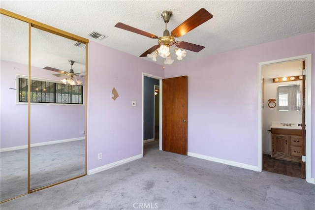 1254 Fieldgate Ave, Hacienda Heights, CA 91745 - unfurnished bedroom featuring carpet, a closet, ensuite bath, ceiling fan, and a textured ceiling