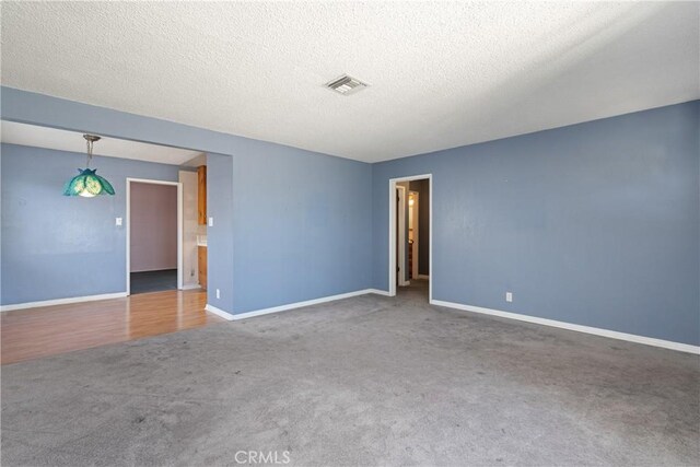 1254 Fieldgate Ave, Hacienda Heights, CA 91745 - carpeted spare room featuring baseboards and a textured ceiling