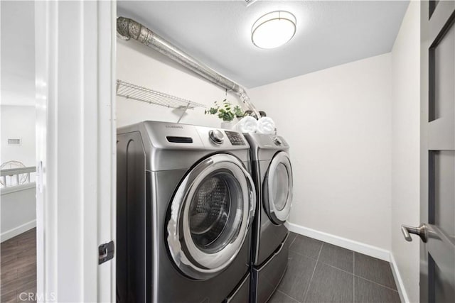 24833 Nueva Vista Dr Unit 2, Laguna Niguel, CA 92677 - laundry room featuring separate washer and dryer and baseboards