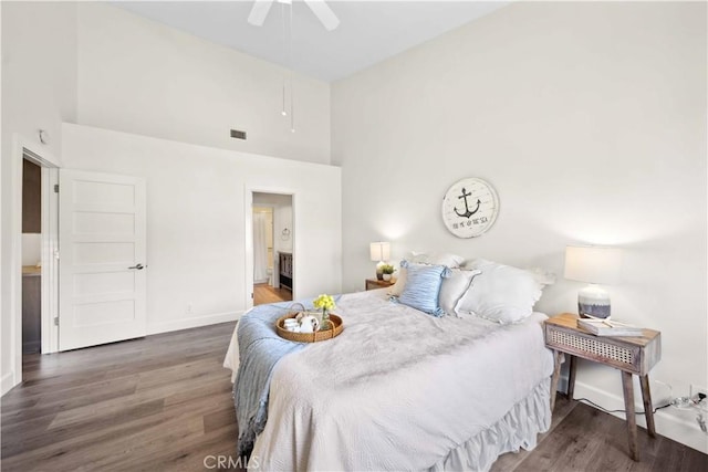 24833 Nueva Vista Dr Unit 2, Laguna Niguel, CA 92677 - bedroom with a high ceiling, wood finished floors, baseboards, ceiling fan, and ensuite bathroom