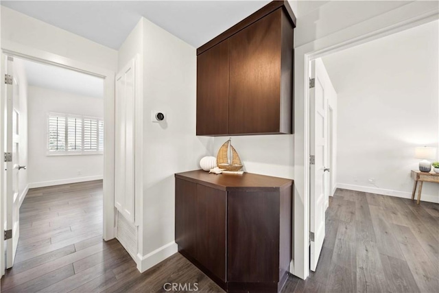 24833 Nueva Vista Dr Unit 2, Laguna Niguel, CA 92677 - hallway featuring dark wood finished floors and baseboards